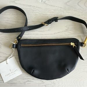 Brand New Abby Alley genuine, black leather sling bag. Sold out online for $285!